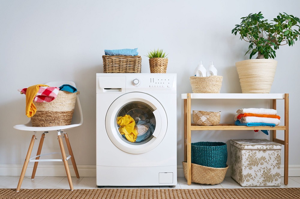 Sử dụng máy giặt hoặc máy sấy chuyên dụng để sấy khô quần áo